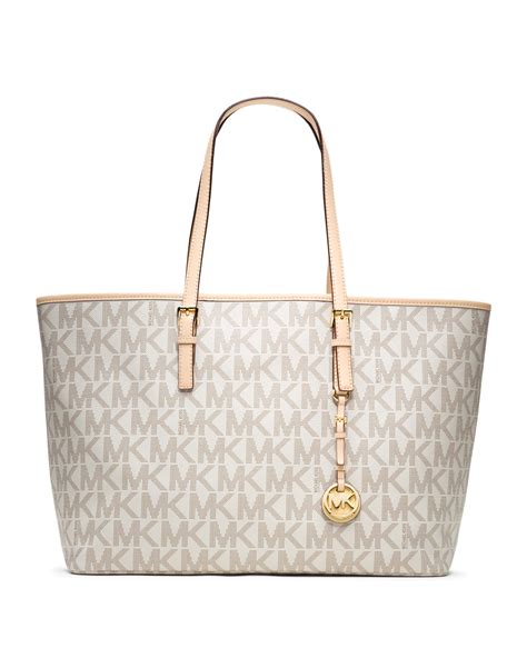 michael kors sandrine satchel and js travel tote|Michael Kors luggage bag.